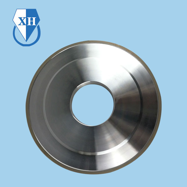 What types of abrasive materials are typically used in bronze bonded grinding wheels